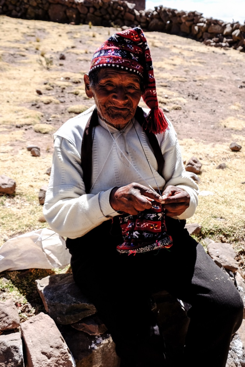 Taquile Island man knitting